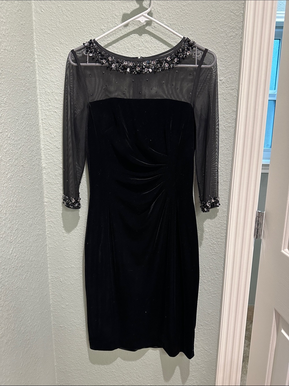 Black velvet Tahari dress. Size 2. Illusion neckline. Beaded neck and cuffs.